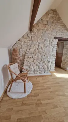 Coin salon dans l'établissement Gîte le petit Hérils