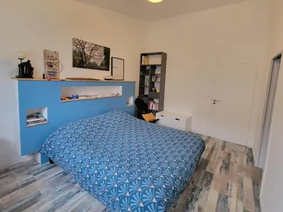 Un ou plusieurs lits dans un hébergement de l'établissement Maison spacieuse proche plage - 4 chambres - FR-1-788-103