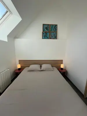 Un ou plusieurs lits dans un hébergement de l'établissement Villa Georgette - Maison au pied du Mont St Michel
