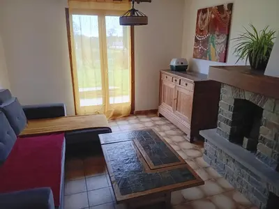 Coin salon dans l'établissement Grande maison à la campagne
