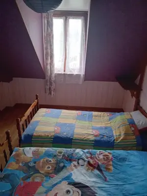 Un ou plusieurs lits dans un hébergement de l'établissement Grande maison à la campagne