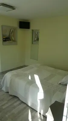Un ou plusieurs lits dans un hébergement de l'établissement Hotel de la Gare