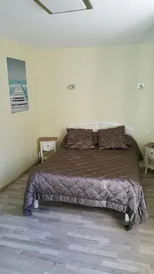Un ou plusieurs lits dans un hébergement de l'établissement Hotel de la Gare