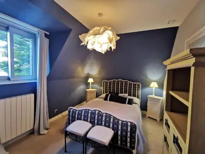 Un ou plusieurs lits dans un hébergement de l'établissement Holiday Home Les Rimains by Interhome