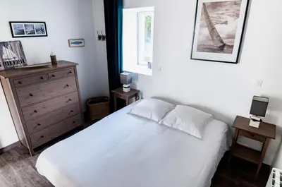 Un ou plusieurs lits dans un hébergement de l'établissement Gite Ferme d'Ervée de Saint-Roch