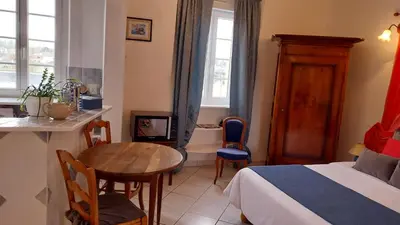 Un ou plusieurs lits dans un hébergement de l'établissement Studio De La Mer