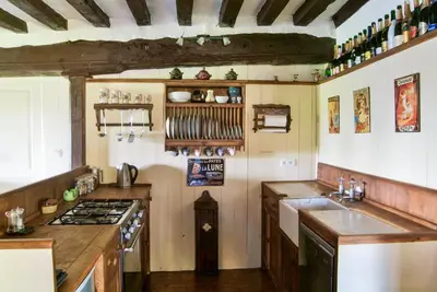 Cuisine ou kitchenette dans l'établissement Le Calipel