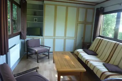 Coin salon dans l'établissement Relais Du Saussay