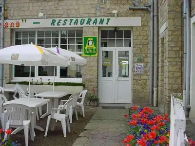 Restaurant ou autre lieu de restauration dans l'établissement Le Clos Normand