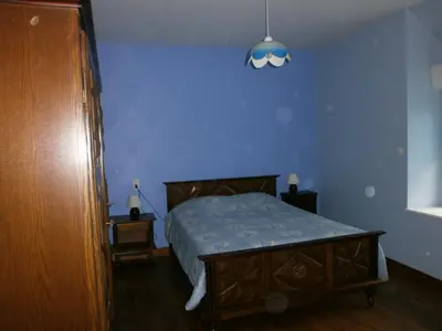 Un ou plusieurs lits dans un hébergement de l'établissement Ferme de la Ruette