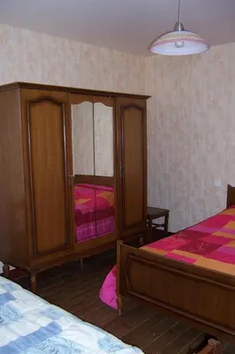 Un ou plusieurs lits dans un hébergement de l'établissement Ferme de la Ruette