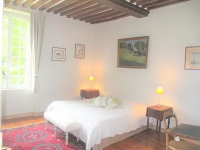 Un ou plusieurs lits dans un hébergement de l'établissement Bed & Breakfast Chateau Les Cèdres