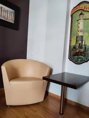 Coin salon dans l'établissement Hôtel Saint - Pierre