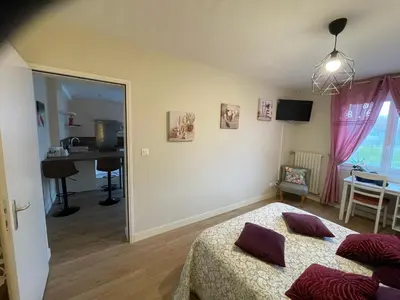 Un ou plusieurs lits dans un hébergement de l'établissement La Villa Port Winston - Face Mer Chambres & Studios