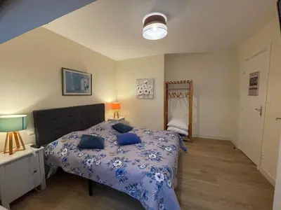 Un ou plusieurs lits dans un hébergement de l'établissement La Villa Port Winston - Face Mer Chambres & Studios