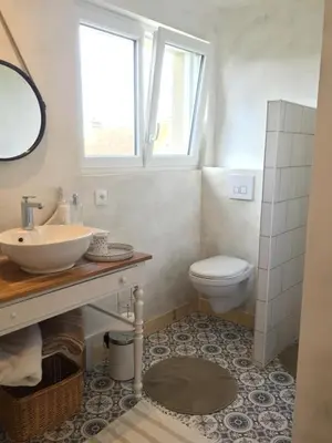 Salle de bains dans l'établissement L'Ermitage