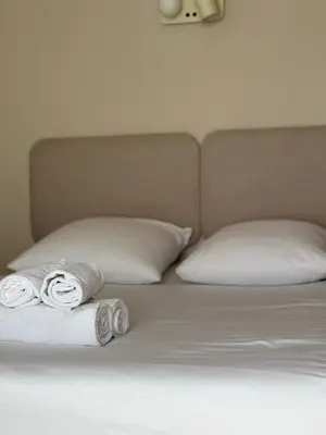 Un ou plusieurs lits dans un hébergement de l'établissement Hotel Bloom