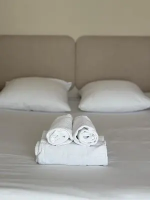 Un ou plusieurs lits dans un hébergement de l'établissement Hotel Bloom