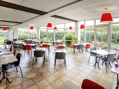 Restaurant ou autre lieu de restauration dans l'établissement ibis Cherbourg La Glacerie