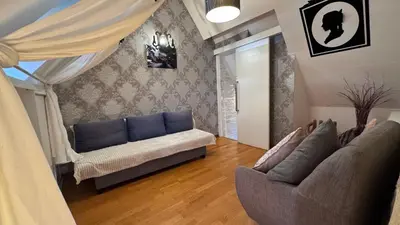 Coin salon dans l'établissement Chambre Centre Ville de Bayeux