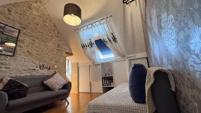 Coin salon dans l'établissement Chambre Centre Ville de Bayeux