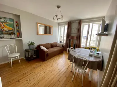 Télévision ou salle de divertissement dans l'établissement Le Petit Logis - Vue Mer