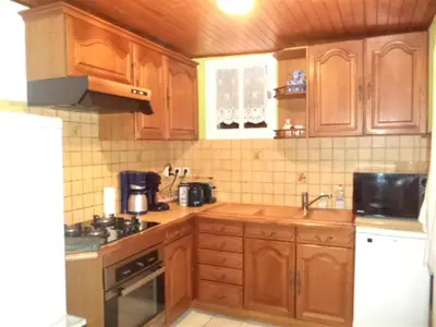Cuisine ou kitchenette dans l'établissement Maison de vacances à Créances