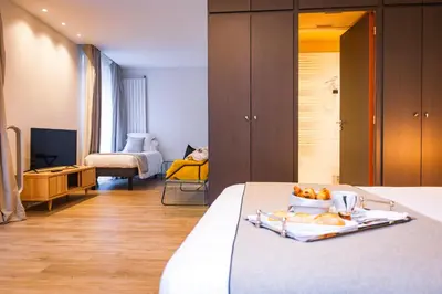 Un ou plusieurs lits dans un hébergement de l'établissement Grand Hôtel du Luxembourg & Spa