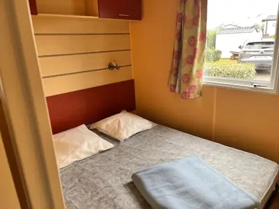 Un ou plusieurs lits dans un hébergement de l'établissement Camping De Collignon