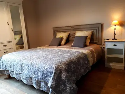 Un ou plusieurs lits dans un hébergement de l'établissement L'Ecurie chambre d'hôtes