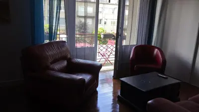 Coin salon dans l'établissement Hôtel Patton