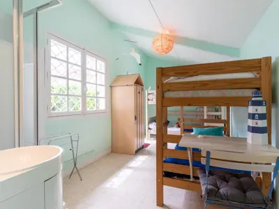 Un ou plusieurs lits dans un hébergement de l'établissement Holiday Home Villa Hélios by Interhome