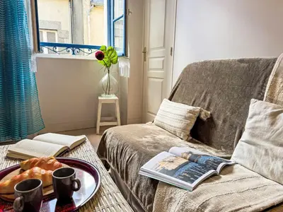 Coin salon dans l'établissement Apartment Le Vieux Port by Interhome