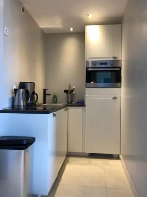 Cuisine ou kitchenette dans l'établissement La Plage d'Or