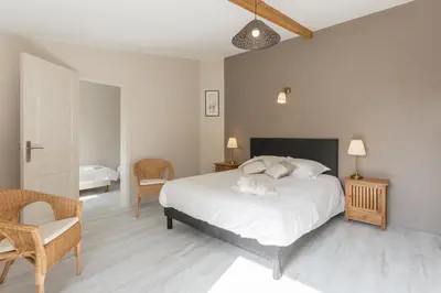 Un ou plusieurs lits dans un hébergement de l'établissement Le Relais des Flâneurs
