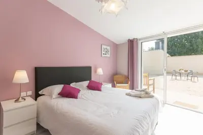 Un ou plusieurs lits dans un hébergement de l'établissement Le Relais des Flâneurs