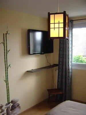 Télévision ou salle de divertissement dans l'établissement Gîte de Eric et Rose