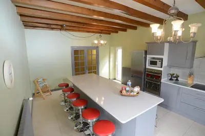 Cuisine ou kitchenette dans l'établissement La Petite Maison