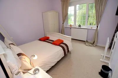 Un ou plusieurs lits dans un hébergement de l'établissement La Petite Maison