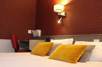 Un ou plusieurs lits dans un hébergement de l'établissement Hôtel Crocus Caen Mémorial