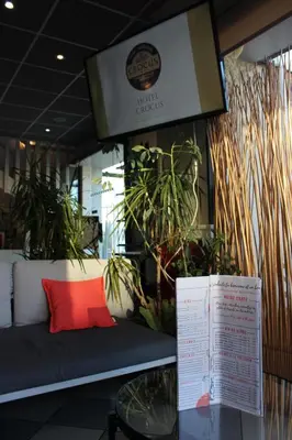 Coin salon dans l'établissement Hôtel Crocus Caen Mémorial