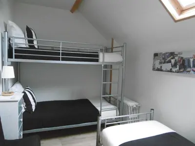 Un ou plusieurs lits dans un hébergement de l'établissement Chambre d'hotes de la Mousse