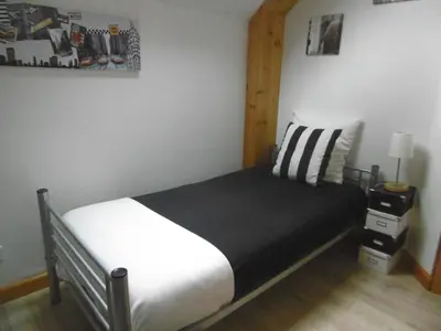 Un ou plusieurs lits dans un hébergement de l'établissement Chambre d'hotes de la Mousse