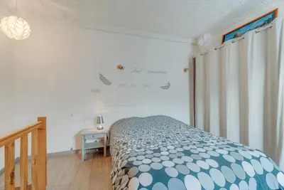 Un ou plusieurs lits dans un hébergement de l'établissement LEPETIT NID DU MONT Maison normande proche de la baie du Mont Saint Michel
