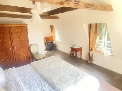 Un ou plusieurs lits dans un hébergement de l'établissement Hôtel Victor Hugo