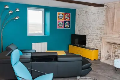 Coin salon dans l'établissement Maison Bayeux 4 chambres