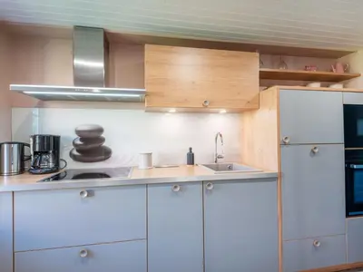 Cuisine ou kitchenette dans l'établissement Holiday Home La Salicorne by Interhome