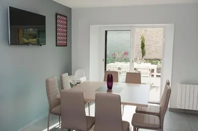 Coin salon dans l'établissement bayeux maison pierre 3 chambres
