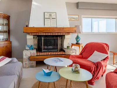 Coin salon dans l'établissement Holiday Home Le Saint Germ by Interhome