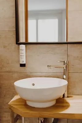 Salle de bains dans l'établissement L'Hôtel Bristol